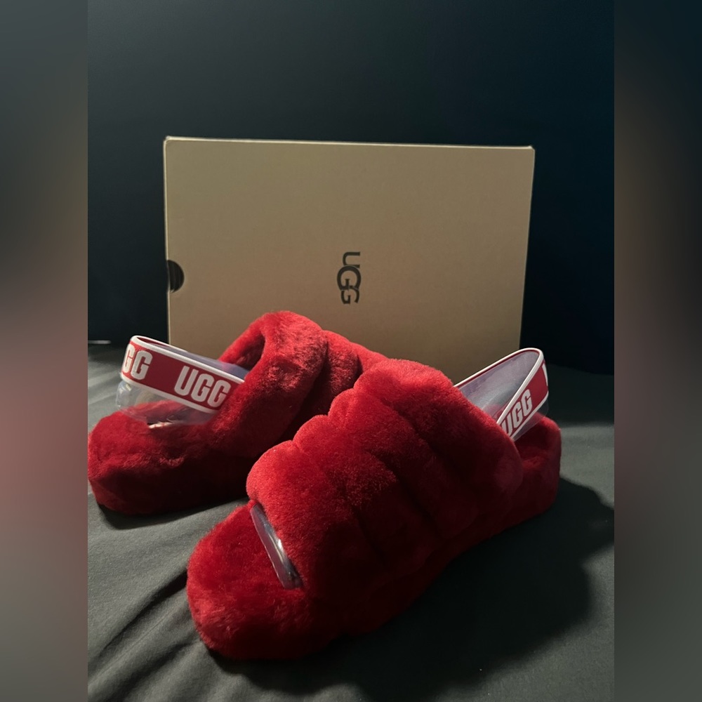 I am selling red fur UGG slides. They have never been worn.